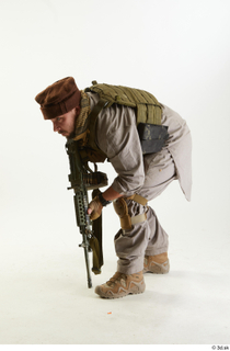 Photos Luis Donovan Army Taliban Gunner Poses crouching whole body…